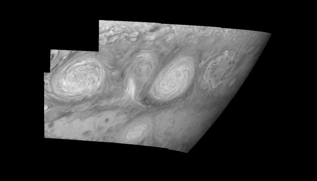 This mosaic shows the features of Jupiter main visible cloud deck and upper-tropospheric haze, with higher features enhanced in brightness over lower features as seen by NASA Galileo orbiter on February 19, 1997.