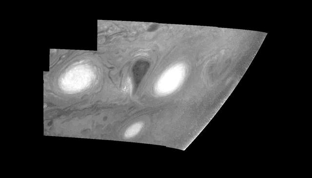 This mosaic shows the features of Jupiter main visible cloud deck and upper-tropospheric haze, with higher features enhanced in brightness over lower features as seen by NASA Galileo orbiter on February 19, 1997.