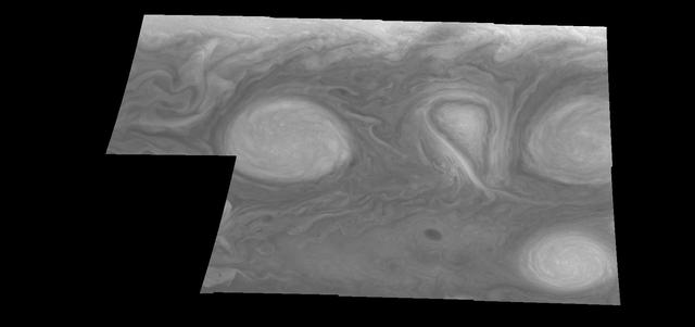 This mosaic shows the features of Jupiter main visible cloud deck and upper-tropospheric haze, with higher features enhanced in brightness over lower features as seen by NASA Galileo orbiter on February 19, 1997.