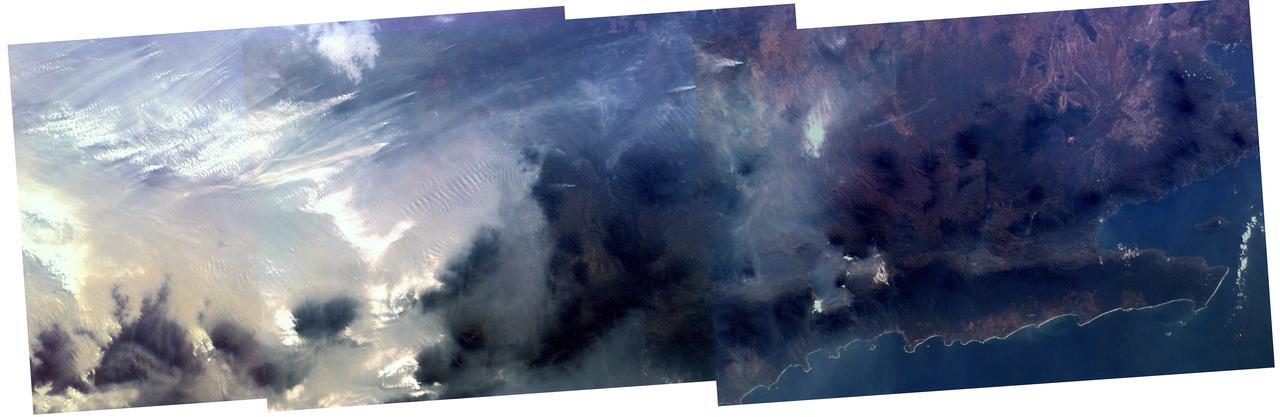 Middle school students across the country photographed the fires and smoke over southern Sumatra from a camera aboard the Space Shuttle Atlantis September 27, 1997.