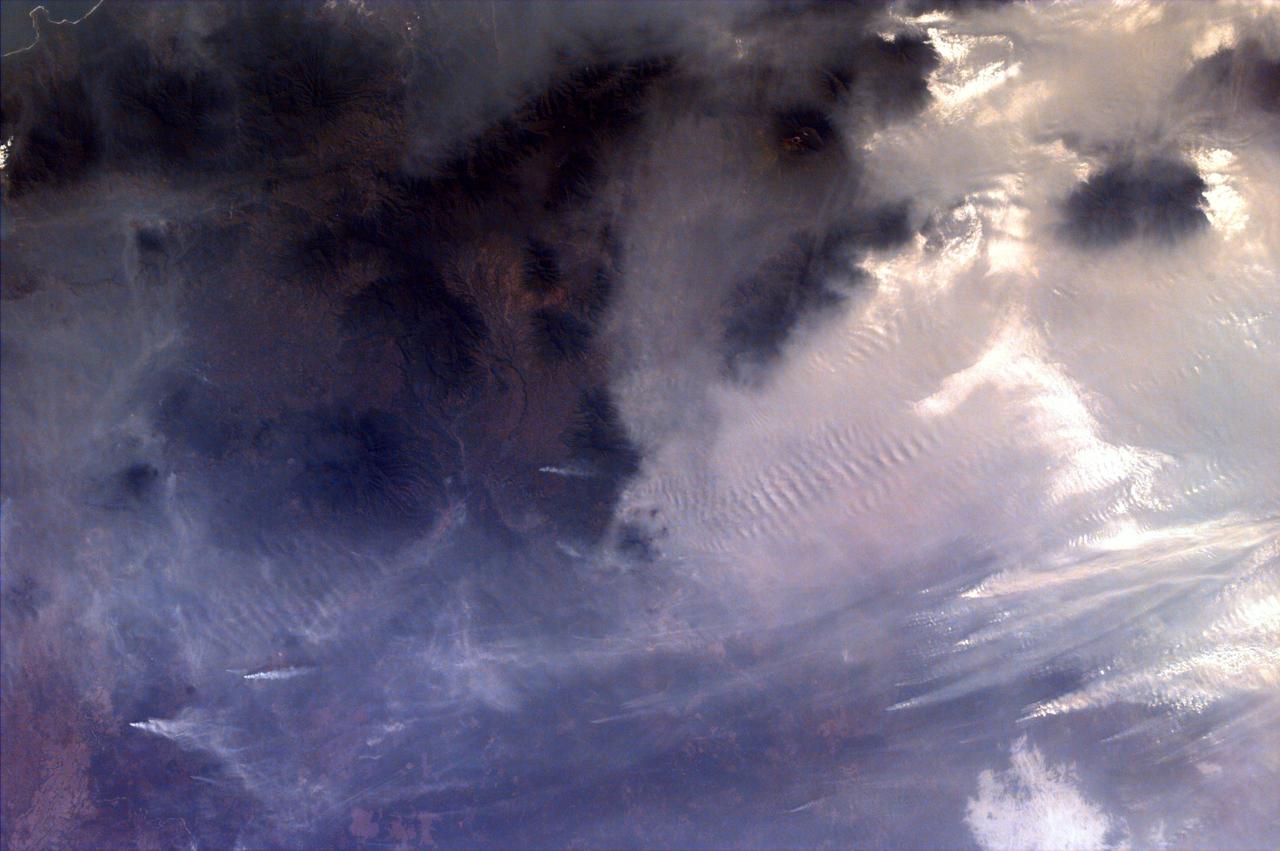 Middle school students across the country photographed the fires and smoke over southern Sumatra from a camera aboard the Space Shuttle Atlantis September 27, 1997.