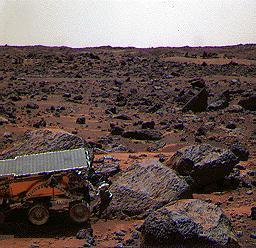This color image shows the Sojourner rover's Alpha Proton X-ray Spectrometer (APXS) deployed against the rock "Moe" on the morning of Sol 65. The rock behind the rover is "Half Dome," which was previously measured by the APXS.   Sojourner spent 83 days of a planned seven-day mission exploring the Martian terrain, acquiring images, and taking chemical, atmospheric and other measurements. The final data transmission received from Pathfinder was at 10:23 UTC on September 27, 1997. Although mission managers tried to restore full communications during the following five months, the successful mission was terminated on March 10, 1998.   http://photojournal.jpl.nasa.gov/catalog/PIA00967