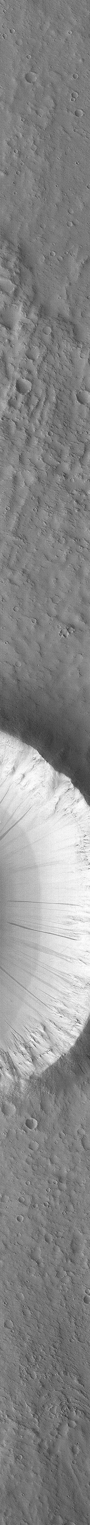 Flow Ejecta and Slope Landslides in Small Crater - High Resolution Image