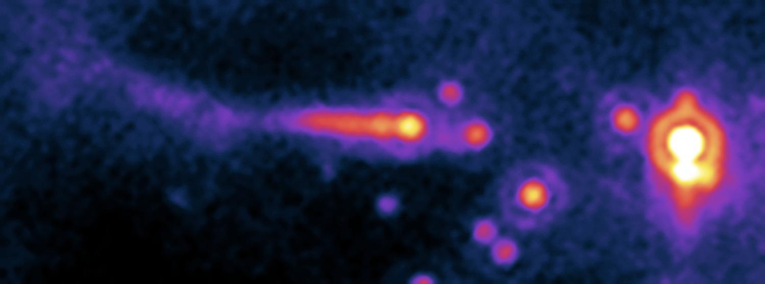 The potential planet-forming disk (or "protoplanetary disk") of a sun-like star is being violently ripped away by the powerful winds of a nearby hot O-type star in this image from NASA's Spitzer Space Telescope. At up to 100 times the mass of sun-like stars, O stars are the most massive and energetic stars in the universe.  The O star can be seen to the right of the image, as the large orange spot with the white center. To the left, the comet-like structure is actually a neighboring solar system that is being destroyed by the O star's powerful winds and intense ultraviolet light.  In a process called "photoevaporation," immense output from the O star heats up the nearby protoplanetary disk so much that gas and dust boil off, and the disk can no longer hold together. Photon (or light) blasts from the O star then strip the potential planet-forming disk off its neighbor star by blowing away evaporated material. This effect is illustrated in the smaller system's comet-like structure.  The system is located about 2,450 light-years away in the star-forming cloud IC 1396. The image was taken with Spitzer's multiband imaging photometer instrument at 24 microns. The picture is a pseudo-color stretch representing intensity. Yellow and white represent hot areas, whereas purple and blue represent relatively cooler, fainter regions.
