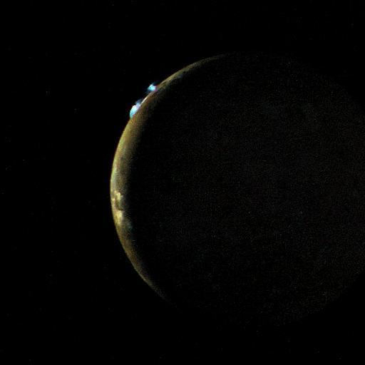 Voyager 2 took this picture of Io on the evening of July 9, 1979, from a range of 1.2 million kilometers. On the limb of Io are two blue volcanic eruption plumes about 100 kilometers high. These two plumes were first seen by Voyager 1 in March, 1979, and are designated Plume 5 (upper) and Plume 6 (lower). They have apparently been erupting for a period of at least 4 months and probably longer. A total of six plumes have been seen by Voyager 2, all of which were first seen by Voyager 1. The largest plume viewed by Voyager 1 (Plume 1) is no longer erupting. Plume 4 was not viewed on the edge of the moon's disc by Voyager 2 and therefore it is not known whether or not it is still erupting. This picture is one of a series taken to monitor the eruptions over a 6 hour period.  http://photojournal.jpl.nasa.gov/catalog/PIA01362