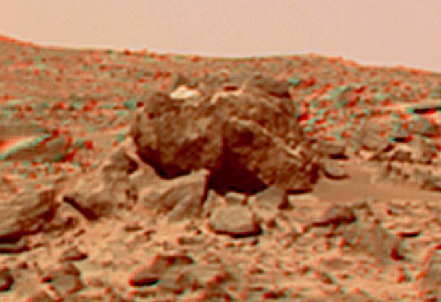This view of the "Hippo," 25 meters to the west of the lander, was produced by combining the "Super Panorama" frames from the IMP camera. Super resolution was applied to help to address questions about the texture of this rock and what it might tell us about its mode of origin.  The composite color frames that make up this anaglyph were produced for both the right and left eye of the IMP. These composites consist of more than 15 frames per eye (because multiple sequences covered the same area), taken with different color filters that were enlarged by 500% and then co-added using Adobe Photoshop to produce, in effect, a super-resolution panchromatic frame that is sharper than an individual frame would be. These panchromatic frames were then colorized with the red, green, and blue filtered images from the same sequence. The color balance was adjusted to approximate the true color of Mars.  The anaglyph view was produced by combining the left with the right eye color composite frames by assigning the left eye composite view to the red color plane and the right eye composite view to the green and blue color planes (cyan), to produce a stereo anaglyph mosaic. This mosaic can be viewed in 3-D on your computer monitor or in color print form by wearing red-blue 3-D glasses.  http://photojournal.jpl.nasa.gov/catalog/PIA01421