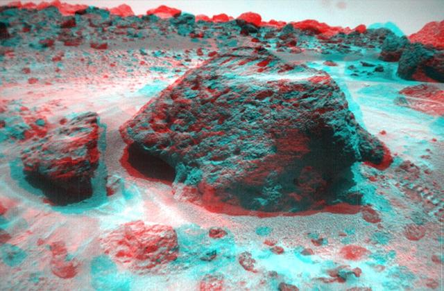This anaglyph view of Souffle, to the left of Yogi, was produced by NASA Mars Pathfinder Imager camera. 3D glasses are necessary to identify surface detail.