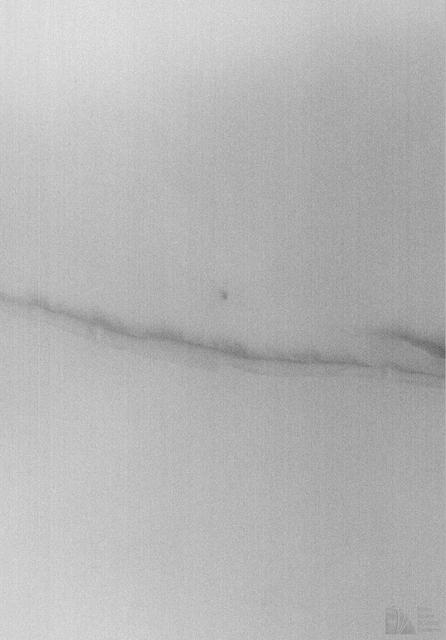 Cloudy Image of Cerberus Rupes Dark Lineation