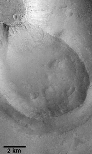 NASA image: Exhumed Crater in Kasei Valles