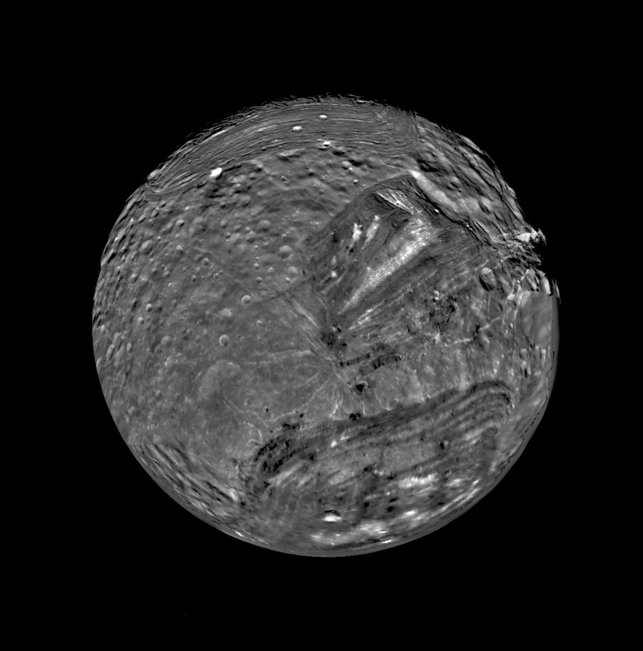 Uranus moon Miranda is shown in a computer-assembled mosaic of images obtained Jan. 24, 1986, by NASA Voyager 2 spacecraft. Miranda is the innermost and smallest of the five major Uranian satellites,