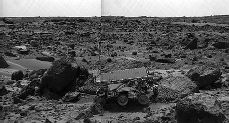 The Sojourner rover's Alpha Proton X-ray Spectrometer (APXS) is shown deployed against the rock "Moe" on the afternoon of Sol 64 (September 7). The rocks to the left of Moe are "Shark" (left of Sojourner) and "Half Dome" (behind Sojourner). They were previously measured by the APXS. The image was taken by the Imager for Mars Pathfinder (IMP). Sojourner spent 83 days of a planned seven-day mission exploring the Martian terrain, acquiring images, and taking chemical, atmospheric and other measurements. The final data transmission received from Pathfinder was at 10:23 UTC on September 27, 1997. Although mission managers tried to restore full communications during the following five months, the successful mission was terminated on March 10, 1998. http://photojournal.jpl.nasa.gov/catalog/PIA01560