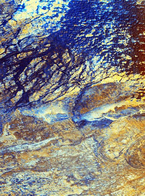 This is a false-color image of the uninhabited Safsaf Oasis in southern Egypt near the Egypt/Sudan border.