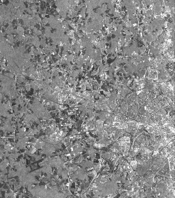 This is a vertically polarized L-band image of the southern half of Moscow, an area which has been inhabited for 2,000 years. The image covers a diameter of approximately 50 kilometers (31 miles) and was taken on September 30, 1994 by the Spaceborne Imaging Radar-C/X-band Synthetic Aperture Radar aboard the space shuttle Endeavour.  The city of Moscow was founded about 750 years ago and today is home to about 8 million residents. The southern half of the circular highway (a road that looks like a ring) can easily be identified as well as the roads and railways radiating out from the center of the city. The city was named after the Moskwa River and replaced Russia's former capital, St. Petersburg, after the Russian Revolution in 1917. The river winding through Moscow shows up in various gray shades. The circular structure of many city roads can easily be identified, although subway connections covering several hundred kilometers are not visible in this image. The white areas within the ring road and outside of it are buildings of the city itself and it suburban towns. Two of many airports are located in the west and southeast of Moscow, near the corners of the image. The Kremlin is located north just outside of the imaged city center. It was actually built in the 16th century, when Ivan III was czar, and is famous for its various churches. In the surrounding area, light gray indicates forests, while the dark patches are agricultural areas. The various shades from middle gray to dark gray indicate different stages of harvesting, ploughing and grassland.  http://photojournal.jpl.nasa.gov/catalog/PIA01752