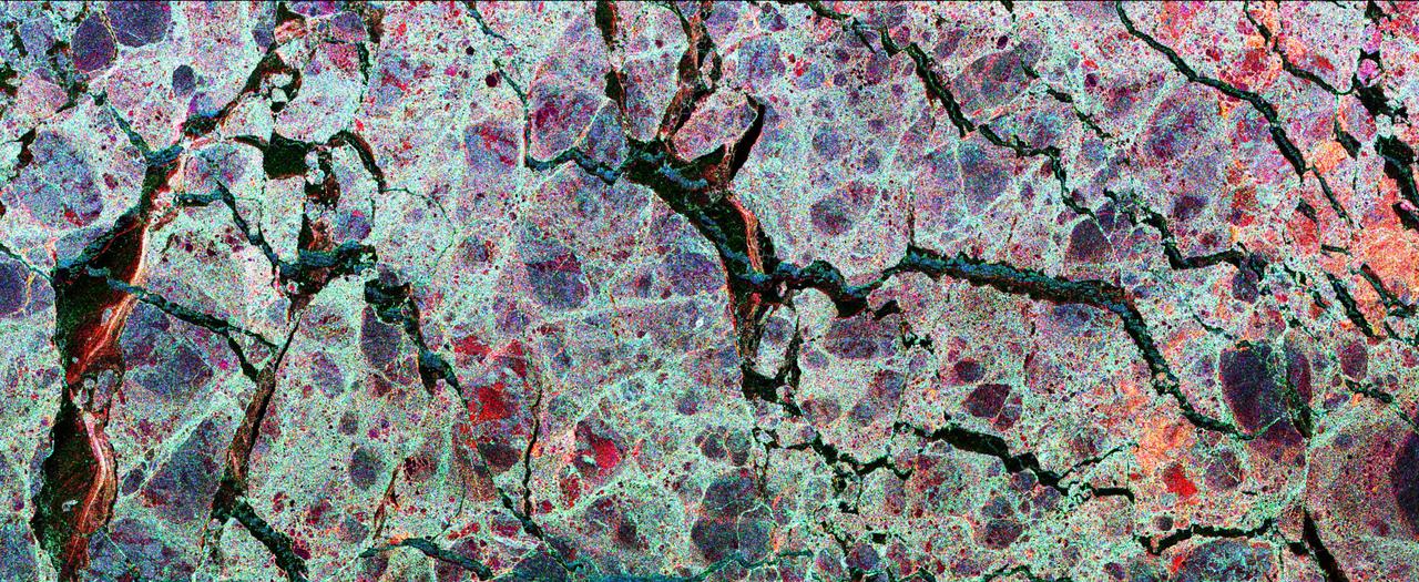 This is the first calibrated, multi-frequency, multi-polarization spaceborne radar image of the seasonal sea-ice cover in the Weddell Sea, Antarctica. The multi-channel data provide scientists with details about the ice pack they cannot see any other way and indicates that the large expanse of sea-ice is, in fact, comprised of many smaller rounded ice floes, shown in blue-gray. These data are particularly useful in helping scientists estimate the thickness of the ice cover which is often extremely difficult to measure with other remote sensing systems. The extent, and especially thickness, of the polar ocean's sea-ice cover together have important implications for global climate by regulating the loss of heat from the ocean to the cold polar atmosphere.  The image was acquired on October 3, 1994, by the Spaceborne Imaging Radar-C/X-Band Synthetic Aperture Radar (SIR-C/X-SAR) onboard the space shuttle Endeavour. This image is produced by overlaying three channels of radar data in the following colors: red (C-band, HH-polarization), green (L-band HV-polarization), and blue (L-band, HH-polarization). The image is oriented almost east-west with a center location of 58.2 degrees South and 21.6 degrees East. Image dimensions are 45 kilometers by 18 kilometers (28 miles by 11 miles). Most of the ice cover is composed of rounded, undeformed blue-gray floes, about 0.7 meters (2 feet) thick, which are surrounded by a jumble of red-tinged deformed ice pieces which are up to 2 meters (7 feet) thick. The winter cycle of ice growth and deformation often causes this ice cover to split apart, exposing open water or "leads." Ice growth within these openings is rapid due to the cold, brisk Antarctic atmosphere. Different stages of new-ice growth can be seen within the linear leads, resulting from continuous opening and closing. The blue lines within the leads are open water areas in new fractures which are roughened by wind. The bright red lines are an intermediate stage of new-ice growth perhaps 5 to 10 centimeters (2 to 4 inches) thick. The more extensive dark zones are covered by a slightly thicker layer of smooth, level ice up to 70 centimeters (28 inches) thick.  http://photojournal.jpl.nasa.gov/catalog/PIA01786