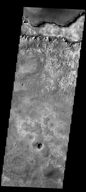 This image shows part of the Meridiani region of Mars, home of the Opportunity Rover. Image information: VIS instrument. Latitude 1.9N, Longitude 358.4E. 36 meter/pixel resolution. http://photojournal.jpl.nasa.gov/catalog/PIA01790
