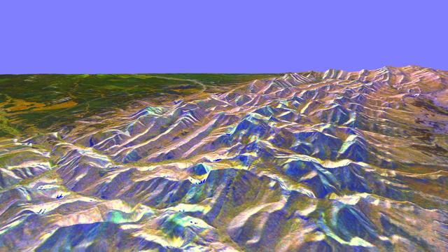 This is a three-dimensional perspective of the eastern front range of the Rocky Mountains, about 120 kilometers 75 miles west of Great Falls, Montana.