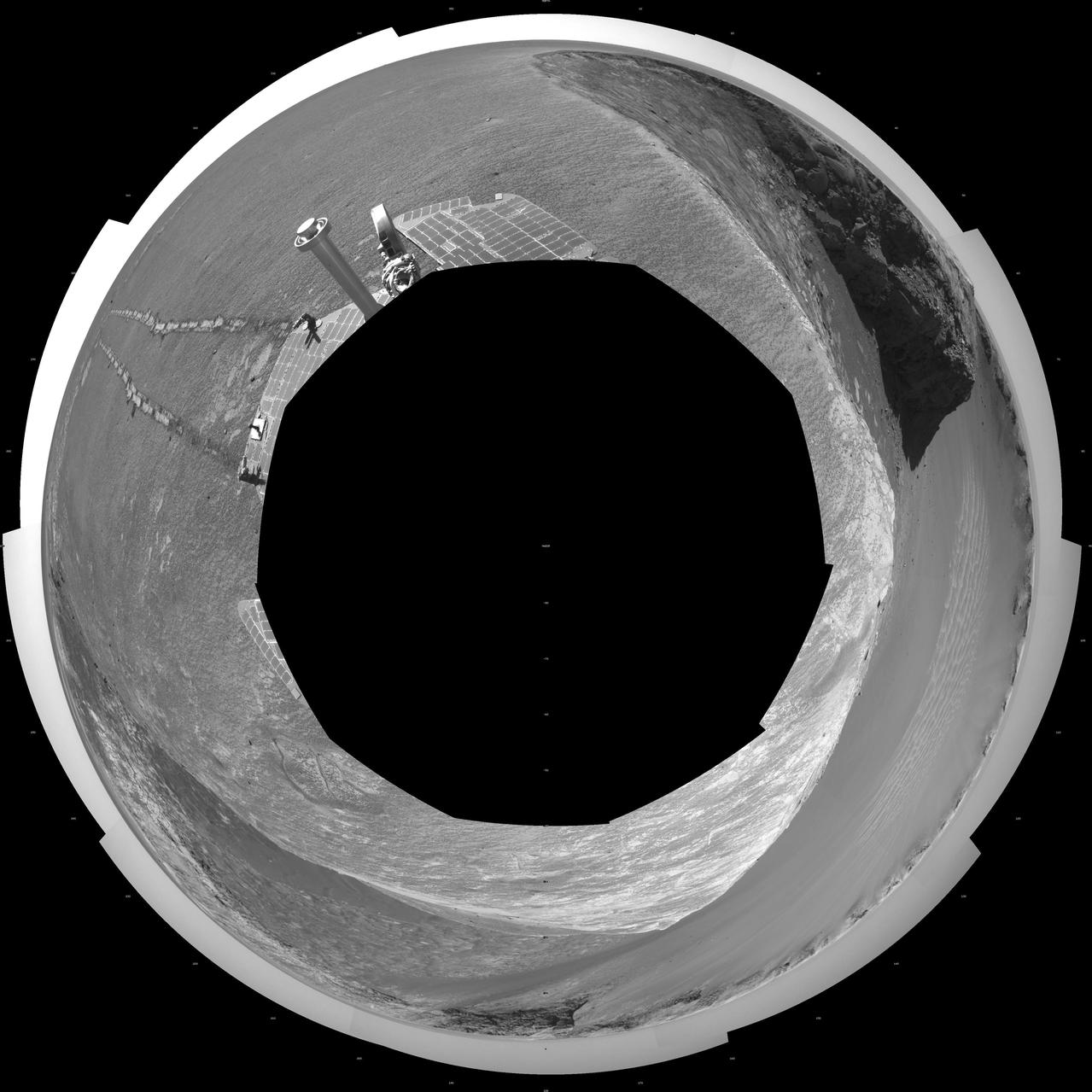 NASA Mars Exploration Rover Opportunity used its navigation camera to take the images combined into this stereo view of the rover surroundings on sol or Martian day 959 of its surface mission