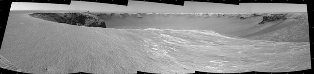 NASA Mars Exploration Rover Opportunity used its navigation camera to take the images combined into this stereo view of the rover surroundings on the 958th sol, or Martian day, of its surface mission Oct. 4, 2006