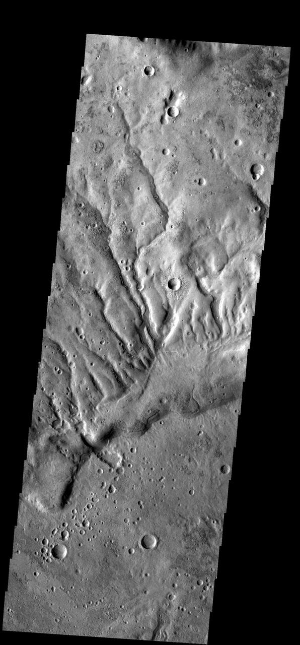 The dissected surface seen in this image from NASA 2001 Mars Odyssey spacecraft is near Warrego Valles.