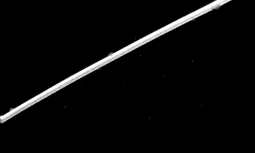 NASA Voyager 2 acquired this high-resolution image of the epsilon ring of Uranus on Jan. 23, 1986. This clear-filter image from Voyager narrow-angle camera has a resolution of about 10 km 6 mi.