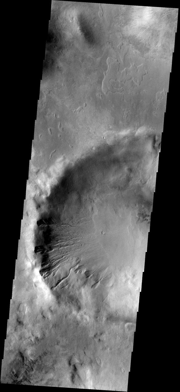 The gullies in this image of Gali Crater occur on the  northfacing/sunfacing slope