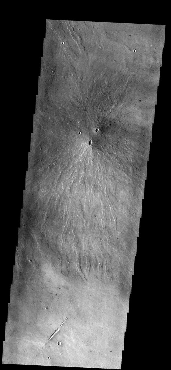 Two volcanic vents have erupted material to form this small volcano just  south of Pavonis Mons