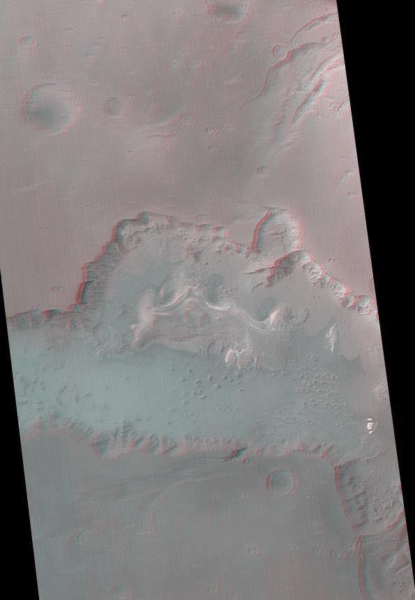 Ganges Chasma is part of the Valles Marineris trough system that stretches nearly 5,000 kilometers 3,000 miles across the western equatorial region of Mars. This stereo anaglyph is from NASA Mars Global Surveyor. 3D glasses are necessary.