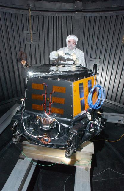 This image shows NASA Deep Impact spacecraft being built at Ball Aerospace & Technologies Corporation, Boulder, Colo. On July 2, 2005. The impactor S-band antenna is the rectangle-shaped object seen on the top of the impactor.