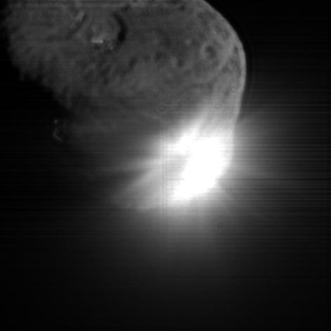This image shows the initial ejecta that resulted when NASA Deep Impact probe collided with comet Tempel 1 on July 3, 2005. It was taken by the spacecraft high-resolution camera 13 seconds after impact. 