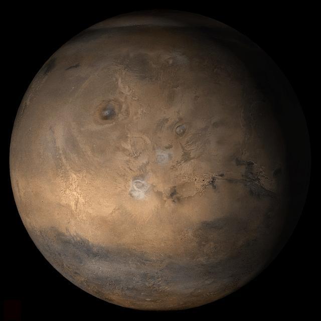 This picture is a composite of Mars Global Surveyor MGS Mars Orbiter Camera MOC daily global images acquired at Ls 12° during a previous Mars year