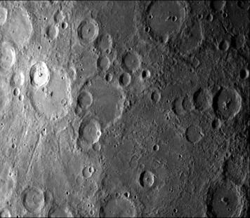 NASA Mariner 10 took this picture some 2 1/2 hours before it passed Mercury on March 29, 1974. The bright-floored crater is the center of a very large bright area which could be seen in pictures from more than two million miles distant