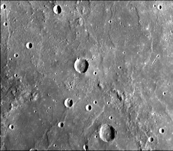 This image, from NASA Mariner 10 spacecraft which launched in 1974, is located about 500 km east of the Caloris basin and shows hummocky plains interpreted as Caloris ejecta in the upper half of the picture and smooth plains in the lower half. 