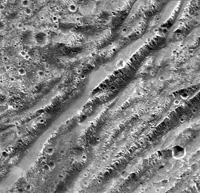 Stair-step Scarps in Dark Terrain on Ganymede