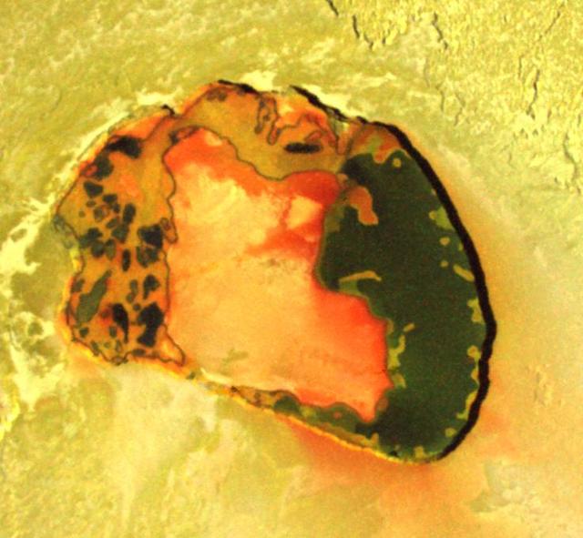 Wonderful colors in a volcanic crater named Tupan Patera on Jupiter moon Io, as seen in this image from NASA Galileo spacecraft, show varied results of lava interacting with sulfur-rich materials.