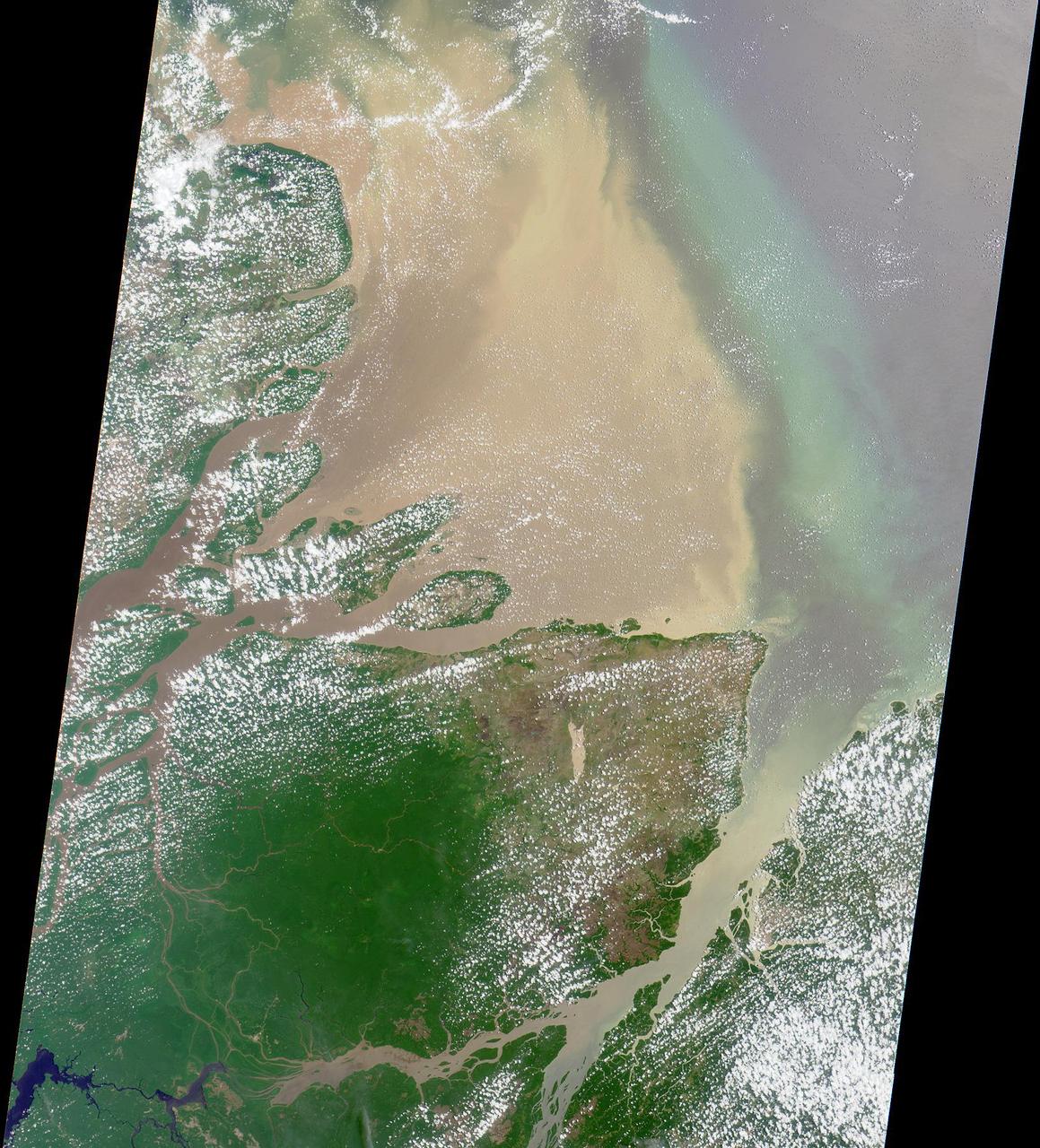 Flowing over 6450 kilometers eastward across Brazil, the Amazon River originates in the Peruvian Andes as tiny mountain streams that eventually combine to form one of the world mightiest rivers as shown in this image from NASA Terra satellite.