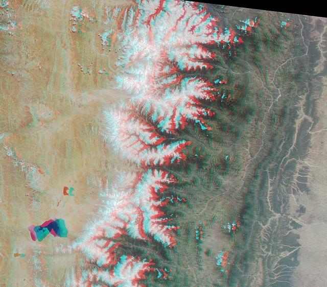 The Tibetan Plateau and a portion of the Himalayan Mountain chain are captured in this stereo image acptured by NASA Terra satellite May 14, 2000 Terra orbit 2153. 