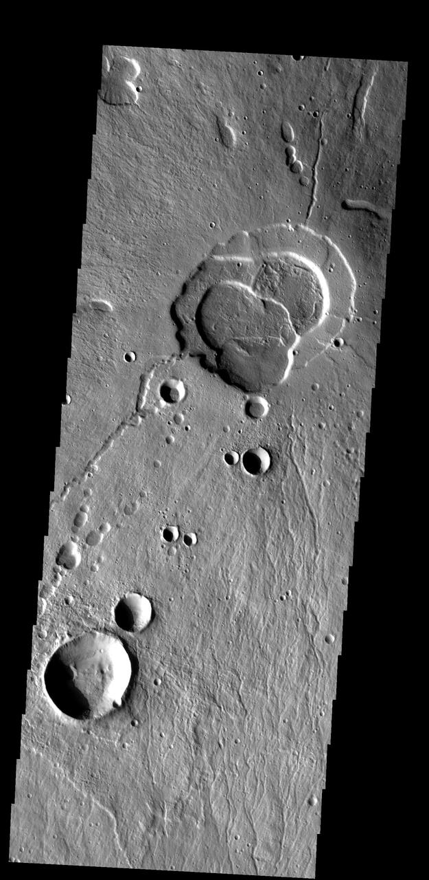 This image shows the summit of Hecates Tholus. The summit caldera is  located in the top of the image