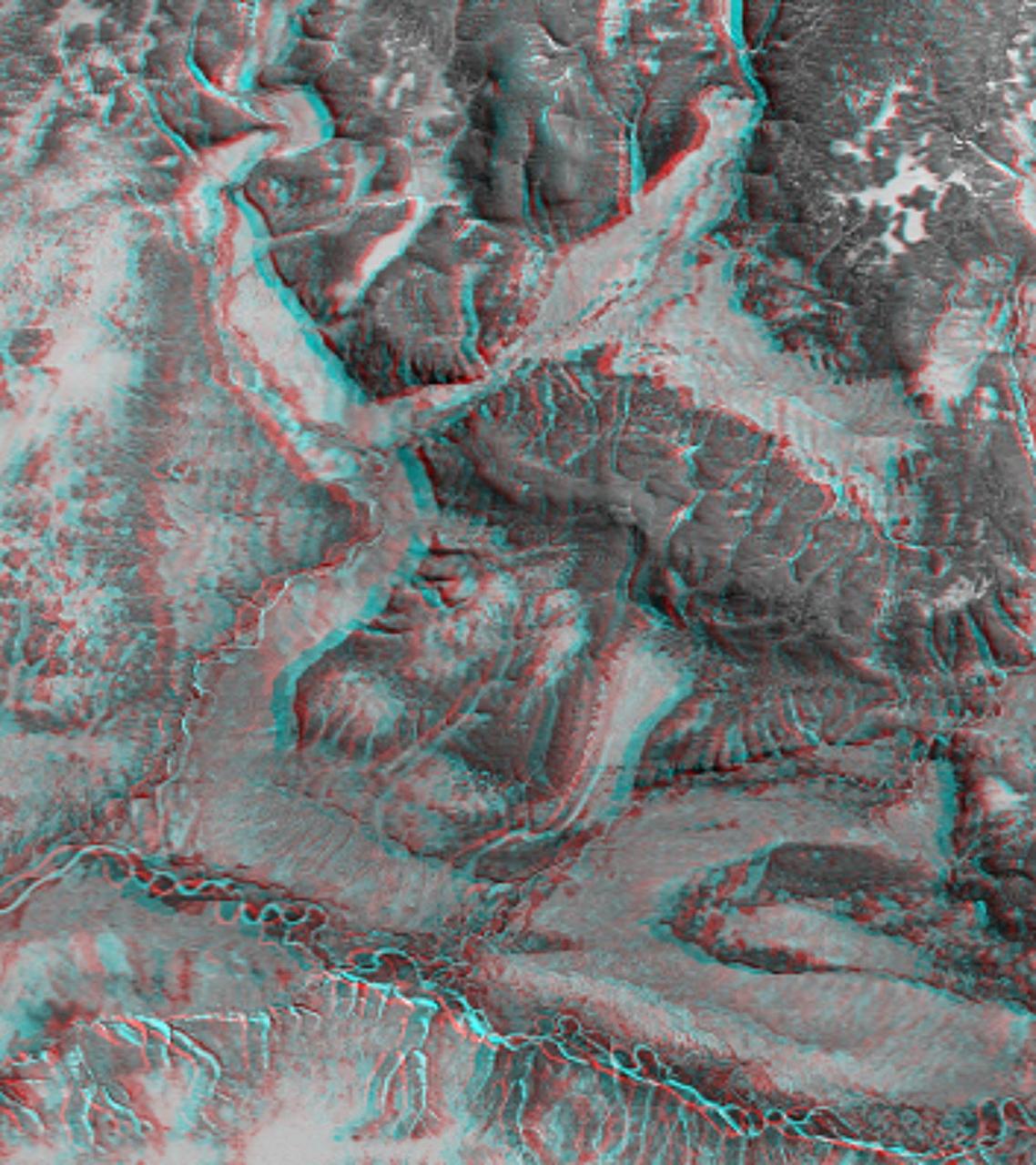 This 3-D anaglyph shows an area on the western side of the volcanically active Kamchatka Peninsula, Russia as seen by the instrument onboard NASA Shuttle Radar Topography Mission. 3D glasses are necessary to view this image.
