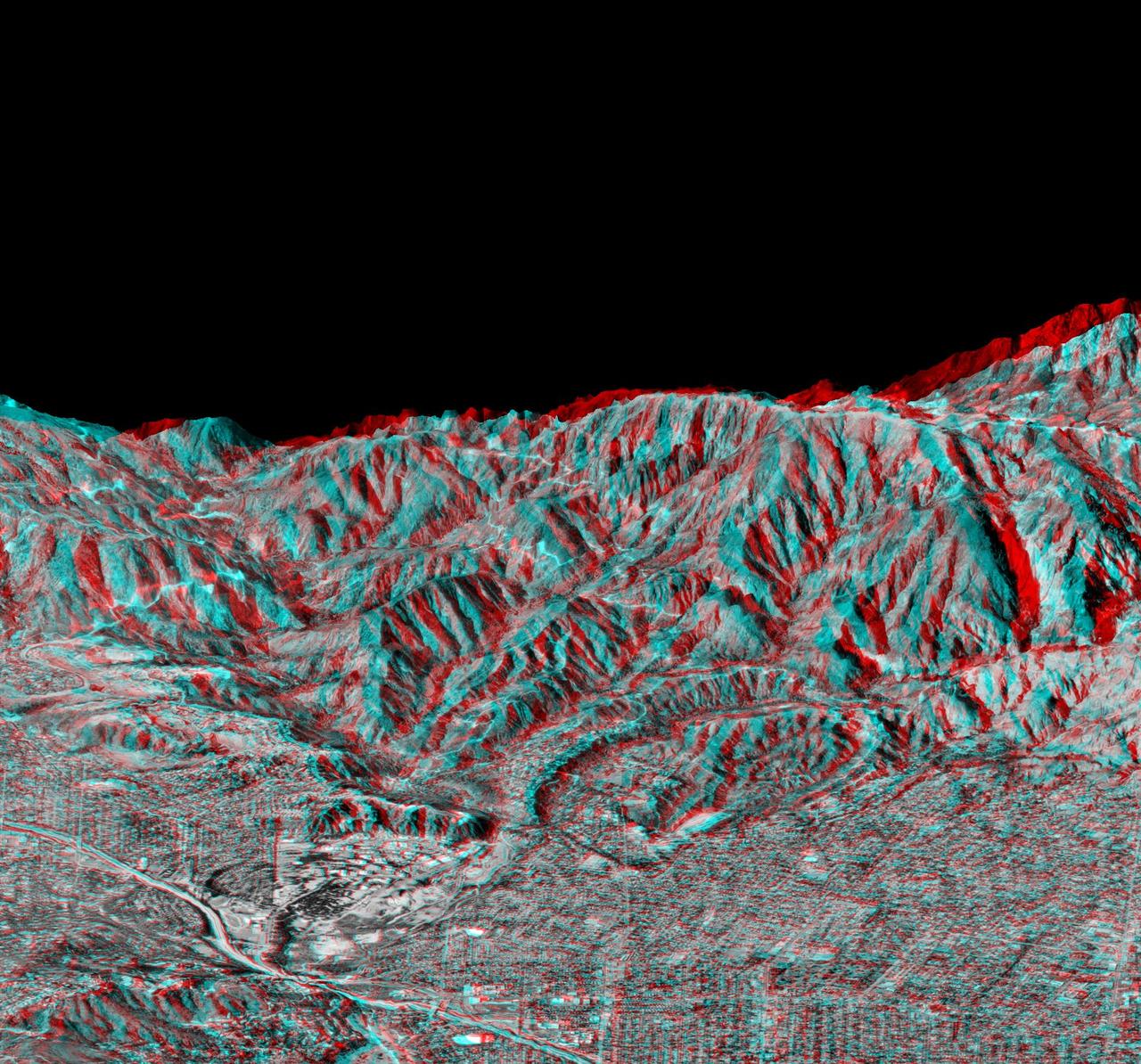 This anaglyph, from NASA Shuttle Radar Topography Mission, is of Pasadena, California, looking north toward the San Gabriel Mountains. 3D glasses are necessary to view this image.