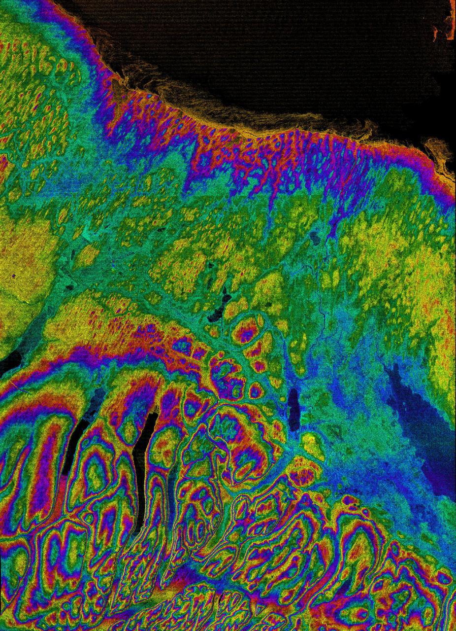 This image shows the northern part of central New York State, a landscape sculpted by the ice sheets of the last ice age. Lake Ontario runs across the top of the image.