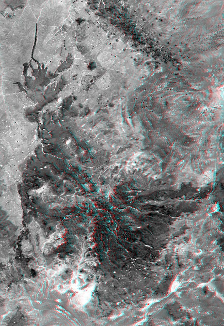 This anaglyph, from NASA Shuttle Radar Topography Mission, shows elatively young volcanoes in northern Patagonia, at Los Menucos, Argentina. 3D glasses are necessary to view this image.