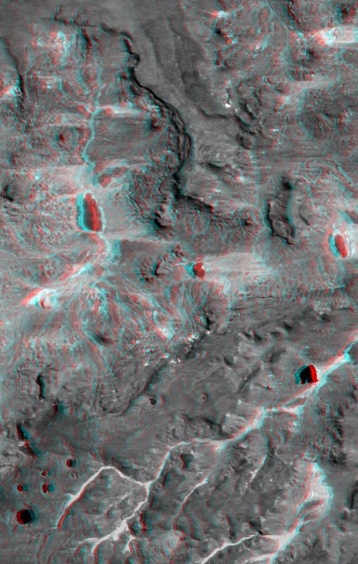 This anaglyph, from NASA Shuttle Radar Topography Mission, shows complexly eroded volcanic terrain in northern Patagonia, near El Cain, Argentina. 3D glasses are necessary to view this image.