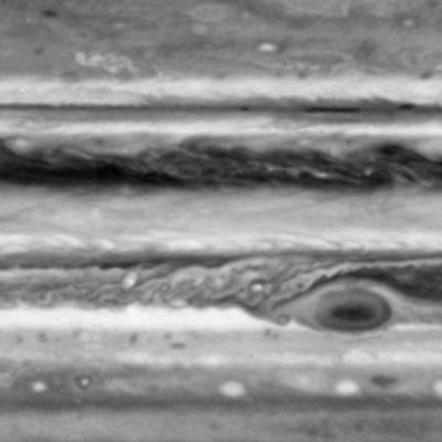 This image is one of seven from the narrow-angle camera on NASA Cassini spacecraft assembled as a brief movie of cloud movements on Jupiter. The smallest features visible are about 500 kilometers about 300 miles across.
