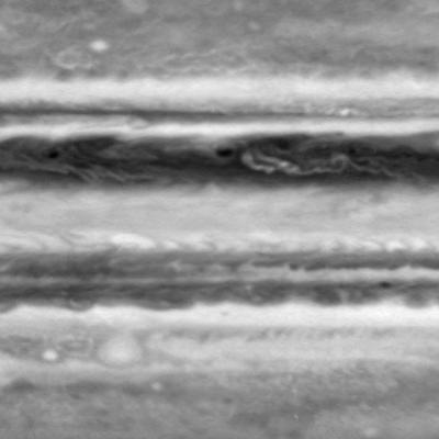This image is one frame from a movie clip of cloud motions on Jupiter, from the side of the planet opposite to the Great Red Spot. It was taken in the first week of October 2000 by the narrow-angle camera on NASA Cassini spacecraft,