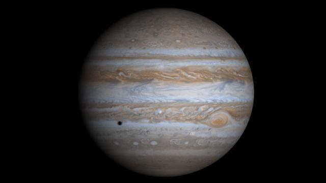 This true-color simulated view of Jupiter is composed of 4 images taken by NASA's Cassini spacecraft on December 7, 2000. To illustrate what Jupiter would have looked like if the cameras had a field-of-view large enough to capture the entire planet, the cylindrical map was projected onto a globe. The resolution is about 144 kilometers (89 miles) per pixel. Jupiter's moon Europa is casting the shadow on the planet. https://photojournal.jpl.nasa.gov/catalog/PIA02873