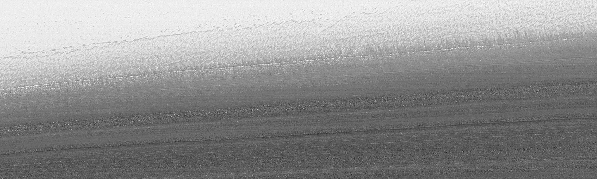 North Polar Cap Layers and Frost on the First Day of Summer