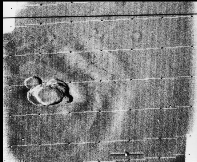 NASA image: Mariner 9 views Olympus Mons standing above the Martian Dust Storm