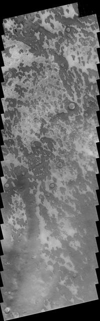 This VIS image captured by NASA 2001 Mars Odyssey spacecraft shows a small area just off the margin of Mars southern polar cap.