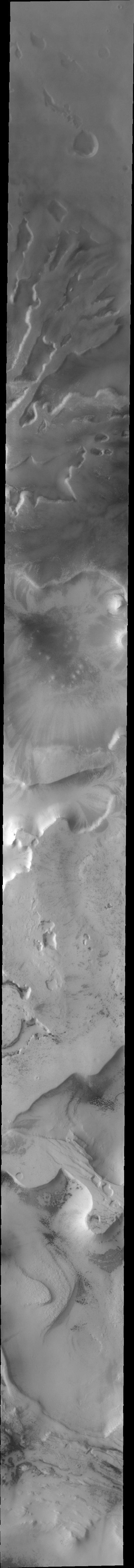 This low resolution VIS image from NASA 2001 Mars Odyssey spacecraft shows a large portion of etched terrain near the south pole of Mars.