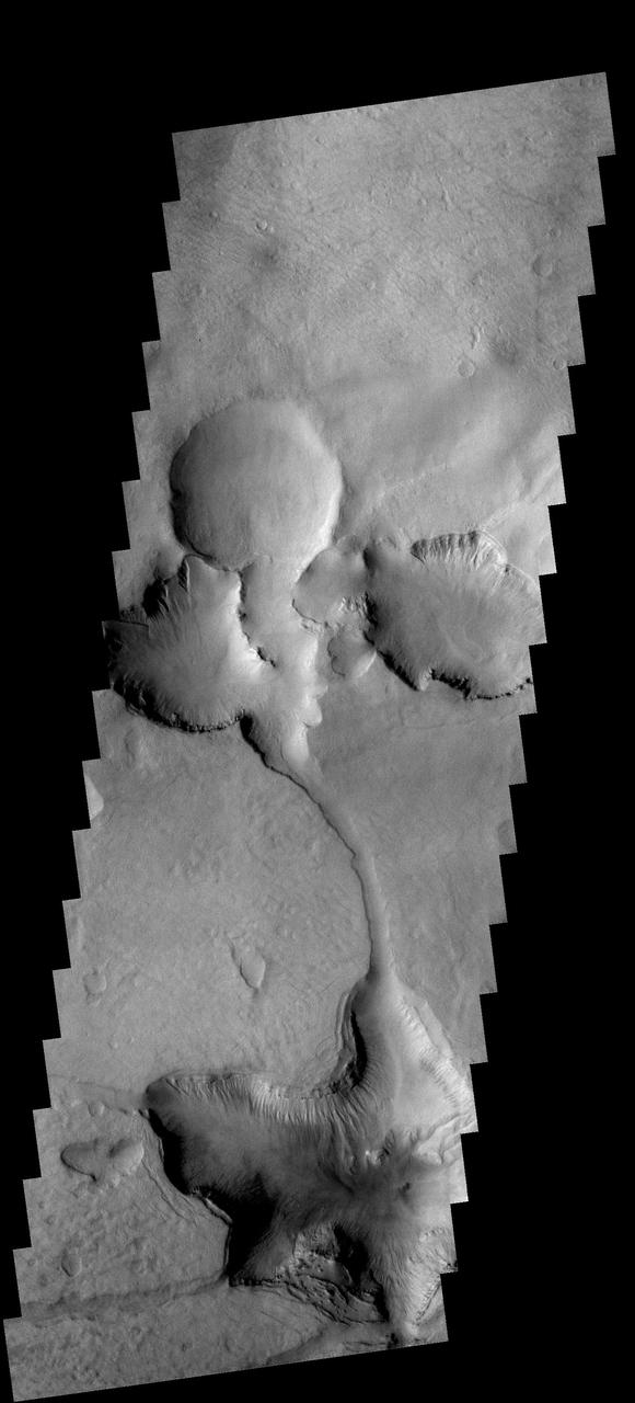 This VIS image from NASA 2001 Mars Odyssey spacecraft shows part of the floor of an unnamed crater located between the Hellas and Argyre Basins. 